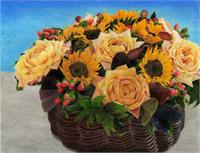 Centerpiece Consisting Of Roses, Sunflowers, And Berries