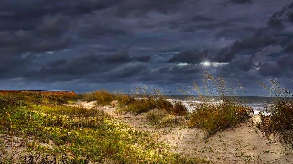 Light Through The Dark Clouds