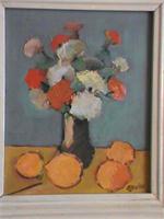 Flowers And Oranges On The Table